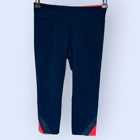 Under Armour size Small leggings, navy with coral accents, EUC - Picture 1 of 10